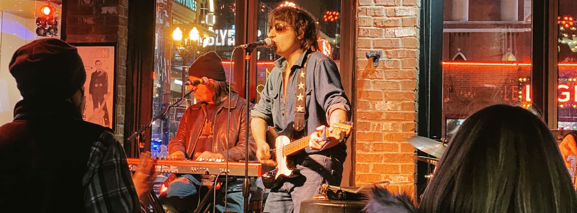 bar singer on guitar in Los Angeles