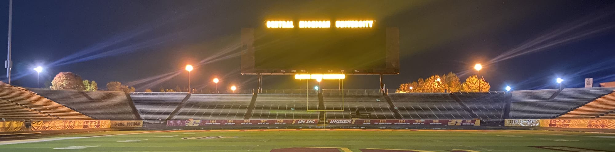 empty football stadium at night under the lights Los Angeles